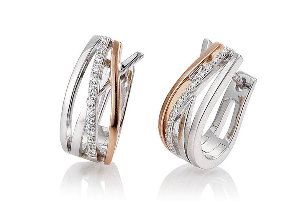 Aretes marca Breuning con diamantes en oro combinado blanco  y rosa de 18k