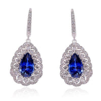 Aretes marca crivelli con diamantes y zafiro en oro blanco de 18k