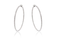 Arracadas marca Crivelli con diamantes en oro blanco de 18k