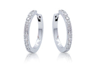 Arracadas marca Breuning con diamantes en oro blanco de 18k