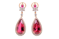Aretes marca Crivelli con diamantes y rubelitas en oro amarillo de 18k