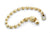 Pulsera hecha de varias elipses en oro amarillo texturizado, en el broche un halo de diamantes Nanis Colección Dancing in the rain